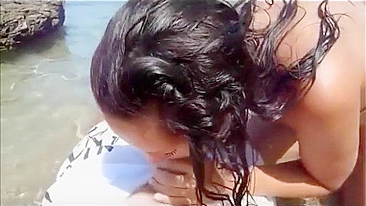 Passionate Couple Engages In Sensual Lovemaking On A Secluded Beach