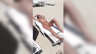 Sultry Woman With Flawless Physique, Shaved Pussy Basks In Beach Sun Sultry Woman With Flawless Physique, Shaved Pussy Basks In Beach Sun