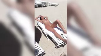 Sultry Woman With Flawless Physique, Shaved Pussy Basks In Beach Sun Sultry Woman With Flawless Physique, Shaved Pussy Basks In Beach Sun