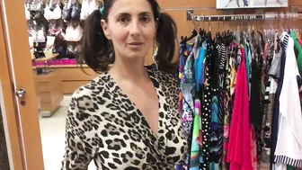 Flirtatious Wife Tantalizes Inquisitive Store-Goers With Risque Try-On Display