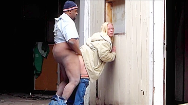 Cheap white prostitute fucked bareback by a fat black client in public