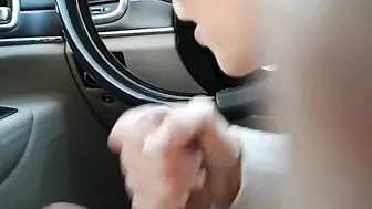 Female co-worker gives a blowjob to a male colleague in the car Female co-worker gives a blowjob to a male colleague in the car