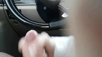 Female co-worker gives a blowjob to a male colleague in the car