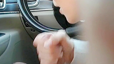 Female co-worker gives a blowjob to a male colleague in the car