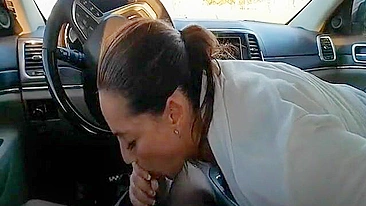 Female co-worker gives a blowjob to a male colleague in the car