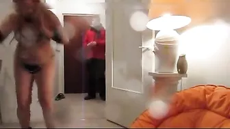 Woman playing a game and flashing nude to pizza guy