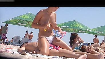 Sultry Young Topless Romanian Girl Filmed By A Perverted Voyeur At The Beach