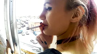 Dude fucking his sexy smoking girlfriend by the window in balcony