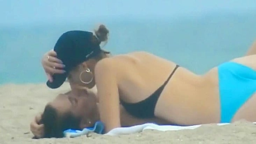 Lesbian couple caught fingering each other at public beach