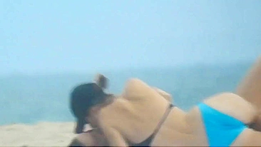 Lesbian couple caught fingering each other at public beach