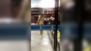 Nude Asian Woman Shopping Bare-Assed In The Store