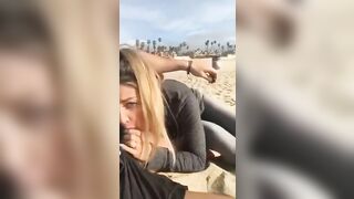 Blonde secretly doing oral sex at the beach