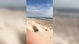 Blonde secretly doing oral sex at the beach