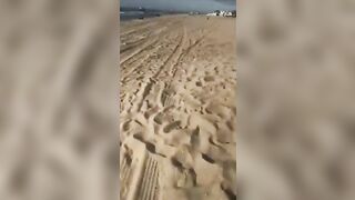 Blonde secretly doing oral sex at the beach