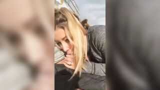 Blonde secretly doing oral sex at the beach