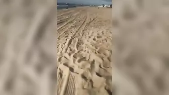 Blonde secretly doing oral sex at the beach