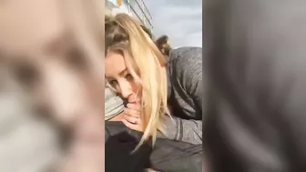 Blonde secretly doing oral sex at the beach