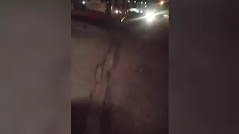 Guy receives blowjob from three women in public place on sidewalk