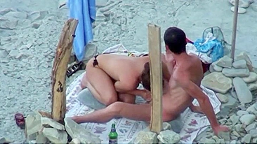 Couple spied on camera at the beach she does a great blowjob