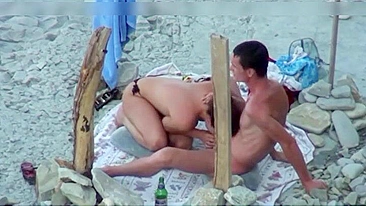 Couple spied on camera at the beach she does a great blowjob