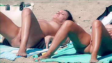 Mature nipples at the beach - real amateur voyeur beach porn video.