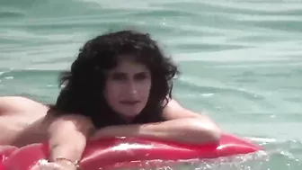 Hot, Sandy-Bodied Nudists Frolicking At The Beach