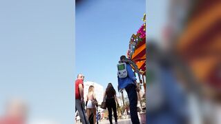 Candid camera in public place filming sexy ass under short skirt