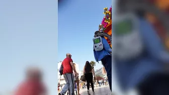 Candid camera in public place filming sexy ass under short skirt