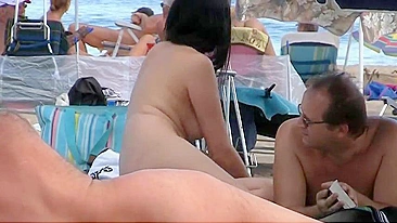 French Nudist Woman With Natural Big Boobs Filmed At The Beach