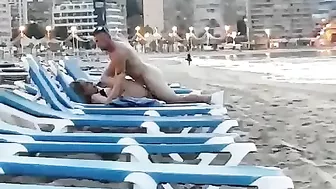 Couple caught voyeur at the beach fucking in public