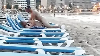 Couple caught voyeur at the beach fucking in public