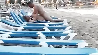 Couple caught voyeur at the beach fucking in public