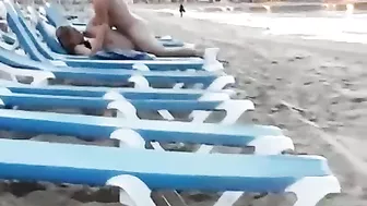 Couple caught voyeur at the beach fucking in public