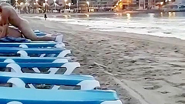 Couple caught voyeur at the beach fucking in public
