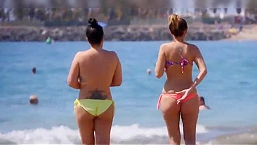 Nudist women with big boobs filmed at the beach