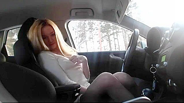 Stunning blonde fingering her pussy and doing penetration in car