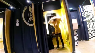 Sultry Exhibitionist Woman Flashing Her Assets In Public Stores