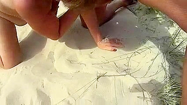 Swinger wife blows nudist stranger at the beach