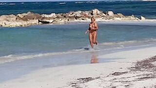 Beautiful, Busty, And Sweaty Nude Female Sprints On Sandy Shore