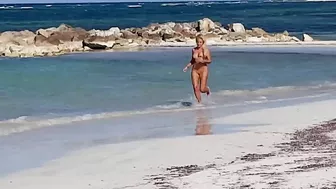 Beautiful, Busty, And Sweaty Nude Female Sprints On Sandy Shore