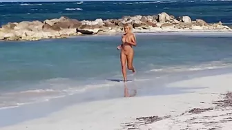 Beautiful, Busty, And Sweaty Nude Female Sprints On Sandy Shore