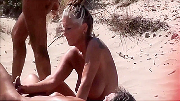 Naughty Milf At The Beach Masturbating With Her Man's Hard Cock