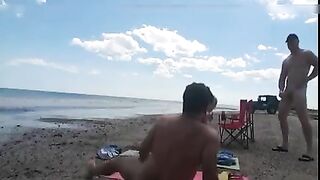 Nudist wife jerks off strangers at the beach and they cum on her