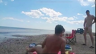 Nudist wife jerks off strangers at the beach and they cum on her