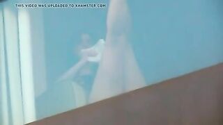 Hidden camera spying on two naked girls in hotel room