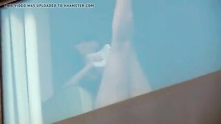 Hidden camera spying on two naked girls in hotel room