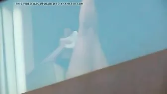 Hidden camera spying on two naked girls in hotel room