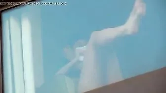 Hidden camera spying on two naked girls in hotel room