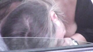 Caught on camera a woman giving blowjob to a stranger in car