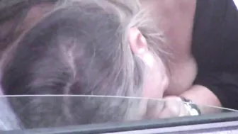 Caught on camera a woman giving blowjob to a stranger in car